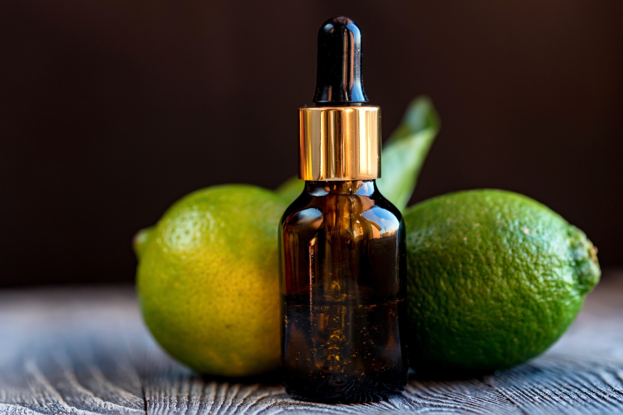 Dropper bottle of lime essential oil